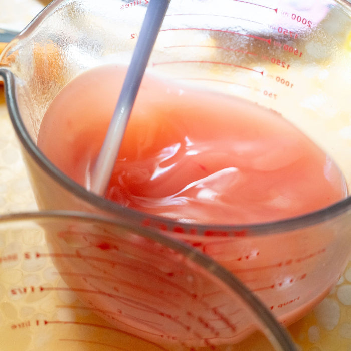 Mixing soap in jar