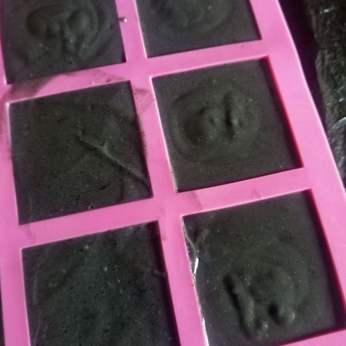 Freshly poured wet soap in silicone mold 